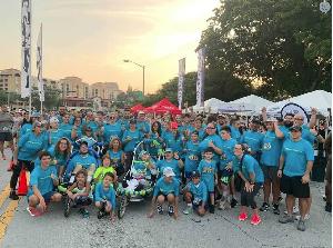 Thumbsup team posing for a picture at the end of a race